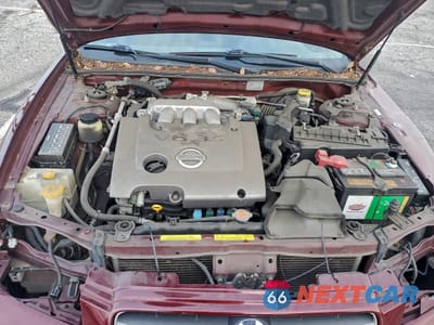 Zdjęcie 11 z 12 samochodu: 2002 NISSAN MAXIMA GLE VIN:JN1DA31D02T445571 - miniatura