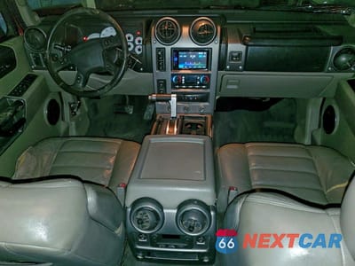 Zdjęcie 8 z 14 samochodu: 2003 HUMMER H2 VIN:5GRGN23U23H144695 - miniatura