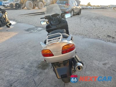Czwarte zdjęcie samochodu z boku: 2003 SUZUKI AN650 K3 VIN:JS1CP51A532102359 - miniatura