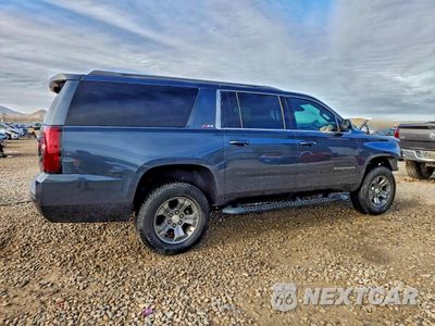 Trzecie zdjęcie samochodu z tyłu: 2019 CHEVROLET SUBURBAN K1500 LT VIN:1GNSKHKC6KR309812 - miniatura
