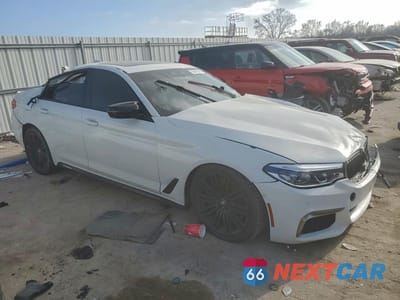 Czwarte zdjęcie samochodu z boku: 2019 BMW M550XI VIN:WBAJB9C52KB287954 - miniatura
