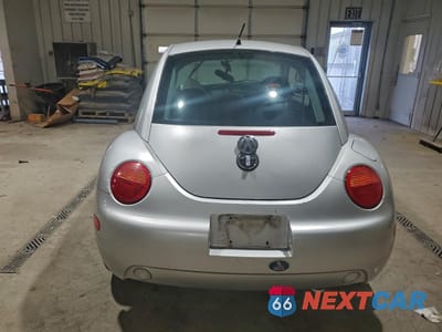 Zdjęcie 6 z 12 samochodu: 2001 VOLKSWAGEN NEW BEETLE GLS TDI VIN:3VWCP21C11M466870 - miniatura