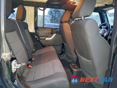 Zdjęcie 11 z 12 samochodu: 2011 JEEP WRANGLER UNLIMITED SAHARA VIN:1J4BA5H13BL603682 - miniatura