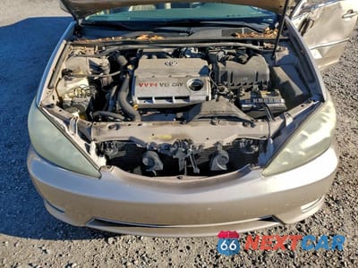 Zdjęcie 11 z 12 samochodu: 2005 TOYOTA CAMRY LE VIN:4T1BF30K65U590341 - miniatura