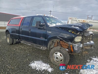 Czwarte zdjęcie samochodu z boku: 1999 FORD F350 SUPER DUTY VIN:1FTWW33F0XED71523 - miniatura