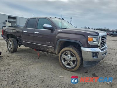 Czwarte zdjęcie samochodu z boku: 2016 GMC SIERRA K2500 SLT VIN:1GT22TEG5GZ269708 - miniatura