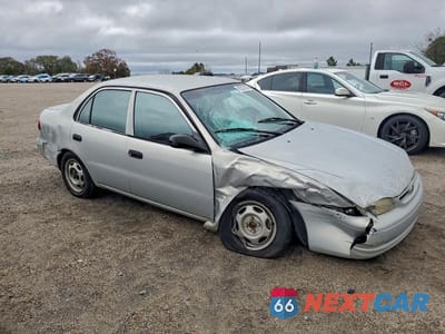 Czwarte zdjęcie samochodu z boku: 2000 TOYOTA COROLLA VE VIN:1NXBR12E0YZ375948 - miniatura