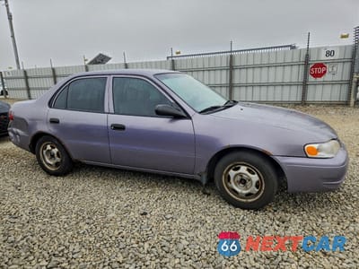 Czwarte zdjęcie samochodu z boku: 1998 TOYOTA COROLLA VE VIN:1NXBR12E1WZ079754 - miniatura