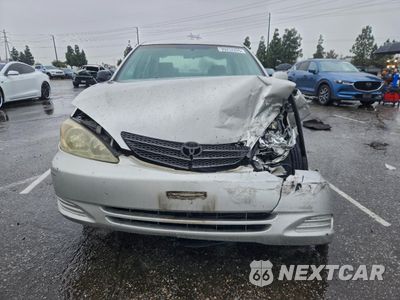 Piąte zdjęcie samochodu w środku: 2003 TOYOTA CAMRY LE VIN:4T1BE32K33U750446 - miniatura