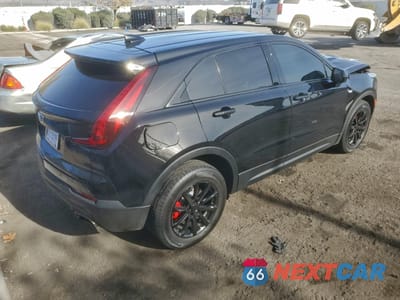 Trzecie zdjęcie samochodu z tyłu: 2023 CADILLAC XT4 LUXURY VIN:1GYAZAR48PF101715 - miniatura