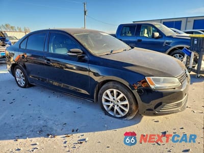 Czwarte zdjęcie samochodu z boku: 2012 VOLKSWAGEN JETTA SE VIN:3VWDX7AJXCM411238 - miniatura