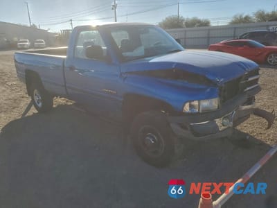 Czwarte zdjęcie samochodu z boku: 1999 DODGE RAM 2500 VIN:3B7KF2668XM524356 - miniatura