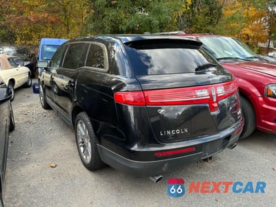 Trzecie zdjęcie samochodu z tyłu: 2016 LINCOLN MKT VIN:2LMHJ5AT1GBL01391 - miniatura