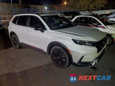 Czwarte zdjęcie samochodu z boku: 2023 HONDA CR-V SPORT TOURING VIN:2HKRS6H90PH803265 - miniatura
