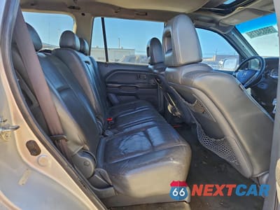 Zdjęcie 10 z 14 samochodu: 2005 HONDA PILOT EXL VIN:5FNYF18525B004826 - miniatura