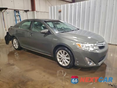 Czwarte zdjęcie samochodu z boku: 2014 TOYOTA CAMRY HYBRID VIN:4T1BD1FK1EU141344 - miniatura