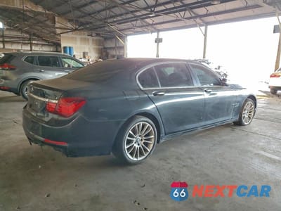 Trzecie zdjęcie samochodu z tyłu: 2013 BMW 750 LXI VIN:WBAYF8C59DD140065 - miniatura
