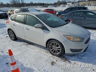 Czwarte zdjęcie samochodu z boku: 2017 FORD FOCUS SE VIN:1FADP3K27HL225481 - miniatura