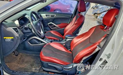 Zdjęcie 7 z 13 samochodu: 2012 HYUNDAI VELOSTER VIN:KMHTC6AD2CU064493 - miniatura