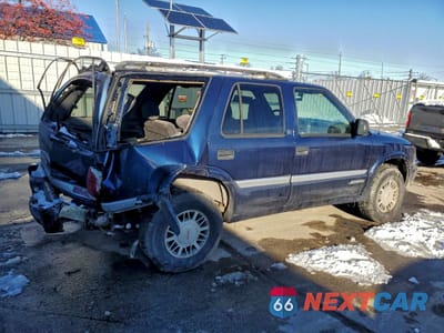 Trzecie zdjęcie samochodu z tyłu: 1999 GMC JIMMY VIN:1GKDT13WXX2558102 - miniatura
