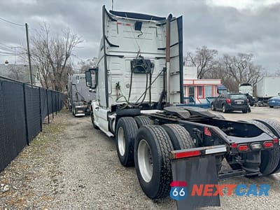 Trzecie zdjęcie samochodu z tyłu: 2014 VOLVO VN VNL VIN:4V4NC9EH1EN167370 - miniatura