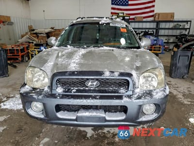Piąte zdjęcie samochodu w środku: 2004 HYUNDAI SANTA FE GLS VIN:KM8SC13D44U853676 - miniatura