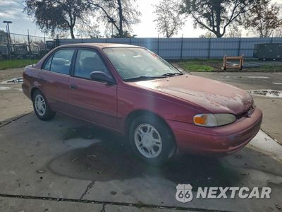 Czwarte zdjęcie samochodu z boku: 2000 CHEVROLET GEO PRIZM BASE VIN:1Y1SK5281YZ421313 - miniatura