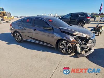 Czwarte zdjęcie samochodu z boku: 2018 HONDA CIVIC EX VIN:JHMFC1F34JX034345 - miniatura