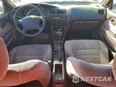 Zdjęcie 8 z 11 samochodu: 1995 TOYOTA COROLLA VIN:1NXAE09B0SZ305337 - miniatura