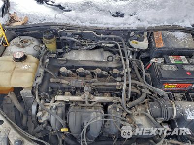 Zdjęcie 11 z 12 samochodu: 2005 FORD FOCUS ZX4 VIN:1FAFP34N95W106700 - miniatura