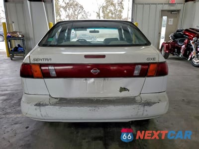 Zdjęcie 6 z 12 samochodu: 1996 NISSAN SENTRA E VIN:1N4AB41D3TC713040 - miniatura