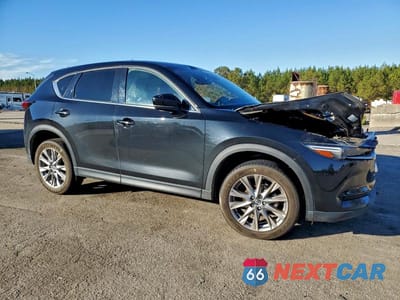 Czwarte zdjęcie samochodu z boku: 2021 MAZDA CX-5 GRAND TOURING VIN:JM3KFADM7M0343069 - miniatura