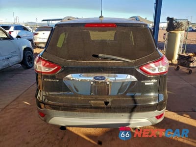 Zdjęcie 6 z 11 samochodu: 2016 FORD ESCAPE TITANIUM VIN:1FMCU9JXXGUA65101 - miniatura