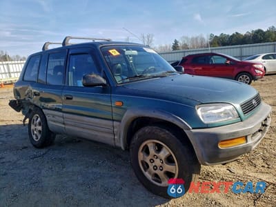 Czwarte zdjęcie samochodu z boku: 1996 TOYOTA RAV4 VIN:JT3GP10V1T7002853 - miniatura