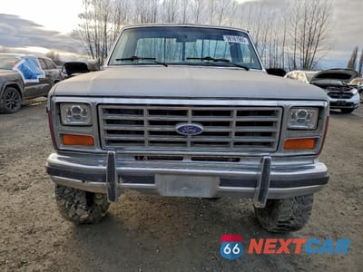 Piąte zdjęcie samochodu w środku: 1985 FORD F150 VIN:1FTEF14N2FPB40339 - miniatura