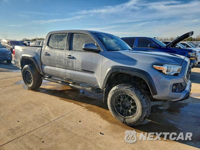 Czwarte zdjęcie samochodu z boku: 2019 TOYOTA TACOMA TRD OFF-ROAD VIN:3TMCZ5AN6KM235870 - miniatura
