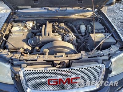 Zdjęcie 11 z 12 samochodu: 2006 GMC ENVOY DENALI XL VIN:1GKET66M066113113 - miniatura
