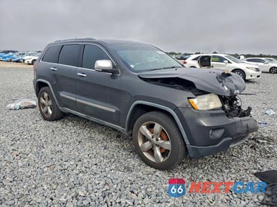 Czwarte zdjęcie samochodu z boku: 2011 JEEP GRAND CHEROKEE OVERLAND VIN:1J4RS6GG6BC659767 - miniatura