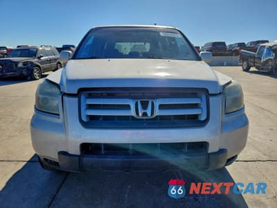 Piąte zdjęcie samochodu w środku: 2005 HONDA PILOT EXL VIN:5FNYF18525B004826 - miniatura