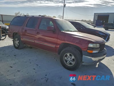 Czwarte zdjęcie samochodu z boku: 2003 CHEVROLET SUBURBAN C1500 VIN:1GNEC16Z63J220824 - miniatura