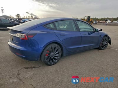 Trzecie zdjęcie samochodu z tyłu: 2022 TESLA MODEL 3 VIN:5YJ3E1EC3NF295403 - miniatura