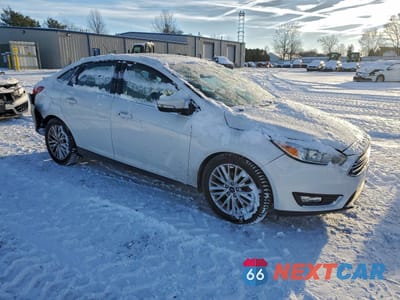 Czwarte zdjęcie samochodu z boku: 2018 FORD FOCUS TITANIUM VIN:1FADP3J25JL294757 - miniatura