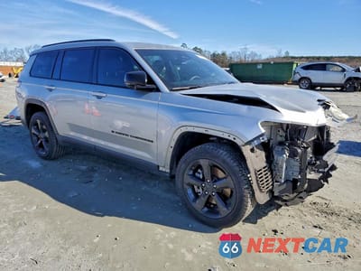Czwarte zdjęcie samochodu z boku: 2023 JEEP GRAND CHEROKEE L LAREDO VIN:1C4RJKAG7P8825220 - miniatura