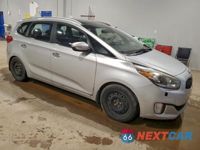 Czwarte zdjęcie samochodu z boku: 2014 KIA RONDO VIN:KNAHU8A33E7071283 - miniatura