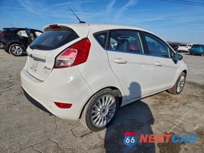 Trzecie zdjęcie samochodu z tyłu: 2015 FORD FIESTA TITANIUM VIN:3FADP4FJ0FM120672 - miniatura