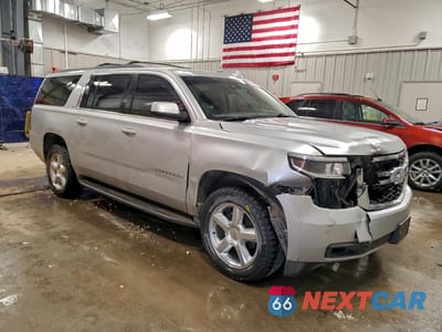 Czwarte zdjęcie samochodu z boku: 2015 CHEVROLET SUBURBAN K1500 LT VIN:1GNSKJKC0FR565652 - miniatura