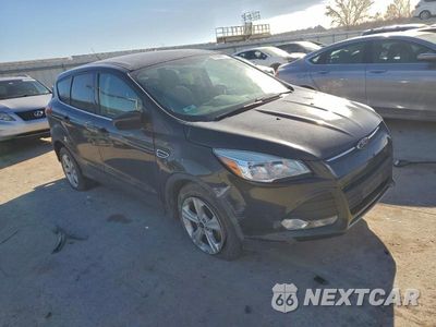 Czwarte zdjęcie samochodu z boku: 2015 FORD ESCAPE SE VIN:1FMCU0G72FUA17318 - miniatura