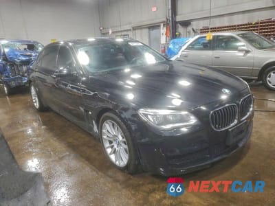 Czwarte zdjęcie samochodu z boku: 2014 BMW 750 LXI VIN:WBAYF8C57ED652635 - miniatura