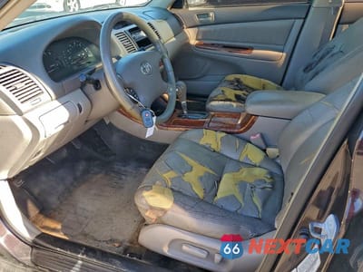 Zdjęcie 7 z 11 samochodu: 2002 TOYOTA CAMRY LE VIN:JTDBF30K720044946 - miniatura