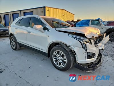 Czwarte zdjęcie samochodu z boku: 2020 CADILLAC XT5 VIN:1GYKNCRS8LZ136600 - miniatura